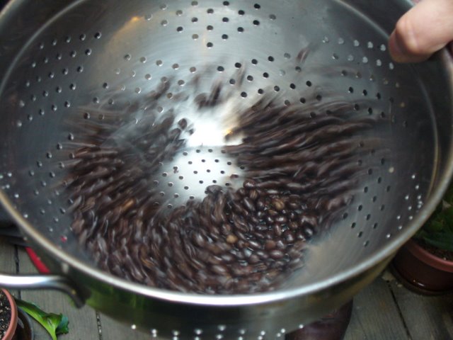 cooldown the coffee using a colander